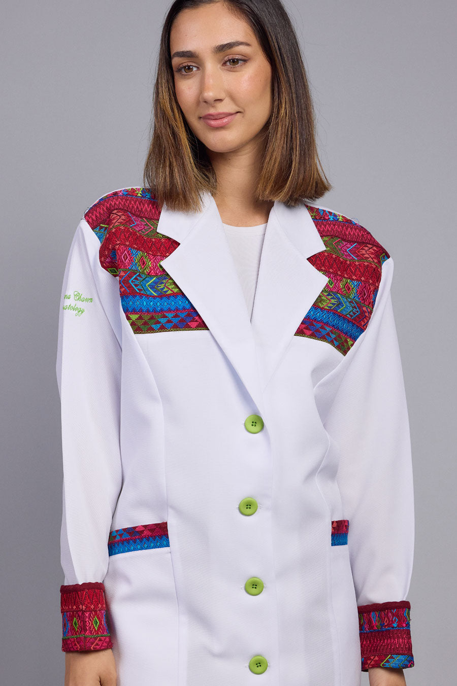 White Coat with typical details.