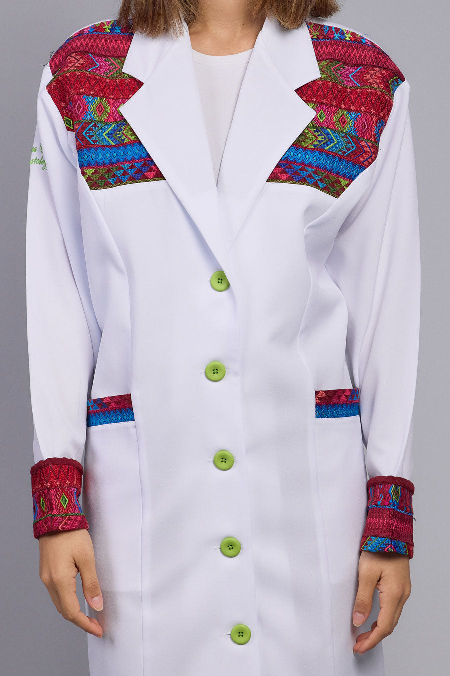 White Coat with typical details.